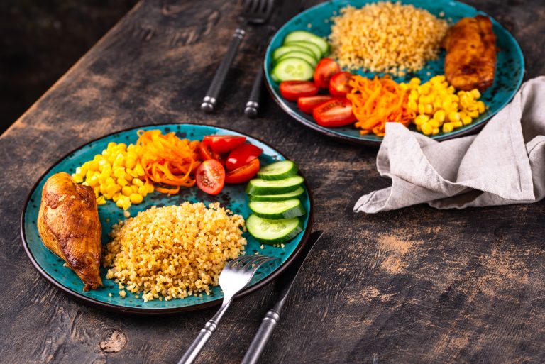 Balanced diet. Healthy food plate with chicken, bulgur and vegetables.